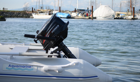 4 hp outboard motor installed on an inflatable boat